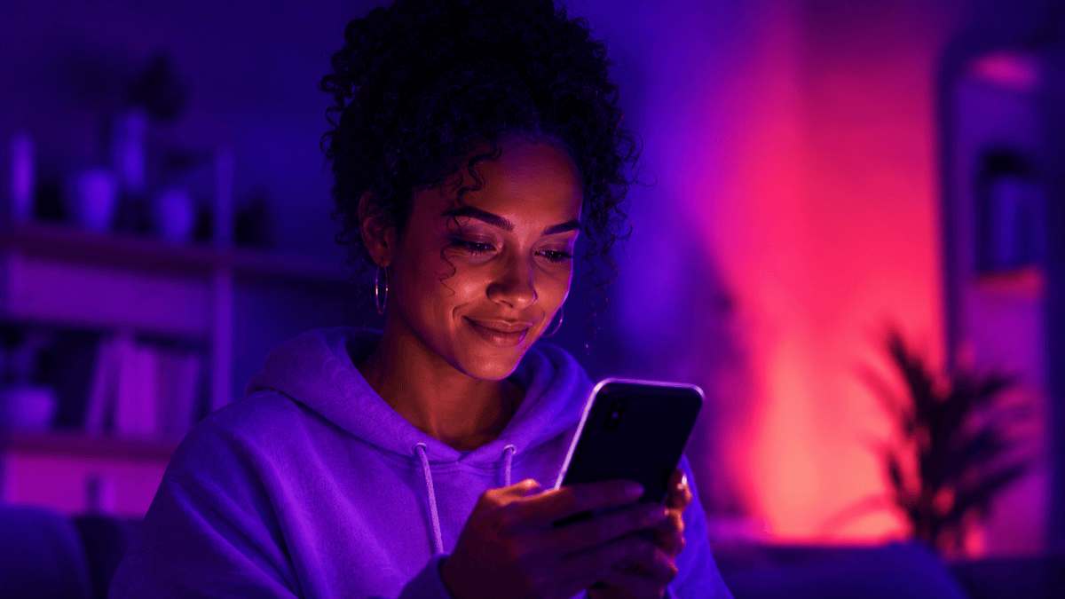 Split-screen of 2 - 3 different-looking people reading a text on their smartphone