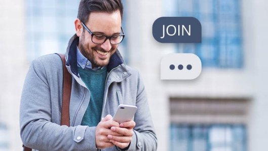 Image of someone joining a text list 