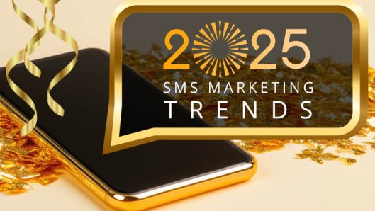 A large, sleek smartphone is slanted on its side and leaning diagonally (as if it’s been NYE partying, lol). A party hat is on the top corner of the phone, party streamers and confetti are on the floor, and a larger text bubble with “2025 SMS Marketing Trends!” comes out of the screen.